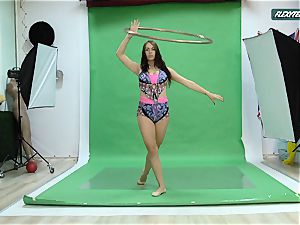 hefty breasts Nicole on the green screen stretching