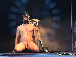 insane fetish injection needle demonstrate on stage